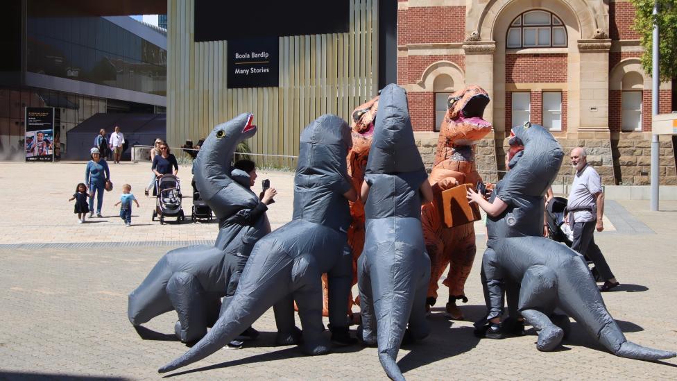 A group of inflatable dinosaurs outside Boola Bardip 